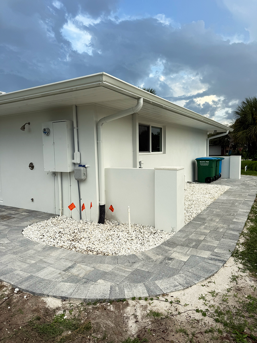 Paver driveway and white gravel installation – Brevard County FL